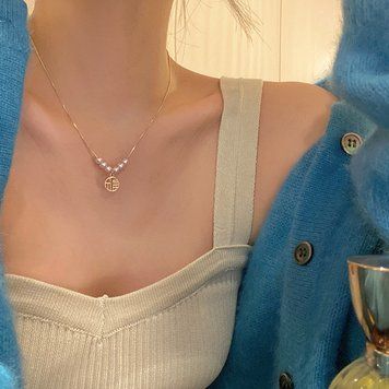 Подвеска женская золотистого цвета &laquo;Talisman&raquo; с подвеской-монетой и жемчугом &mdash; фото