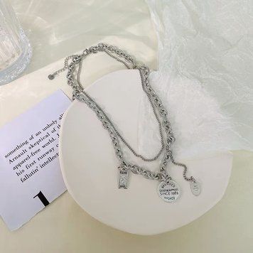 Підвіска жіноча срібного кольору &laquo;Vintage Tag&raquo; з підвісками &mdash; фото